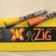 Two Zig Posterman markers shown with an example of how they can be used with tape