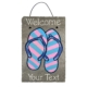 Personalized Summer Flip Flop Sandals Welcome Slate Sign features a pair of pink and blue striped flip flop style sandals with the words "Welcome" and "Your Text" in white font.